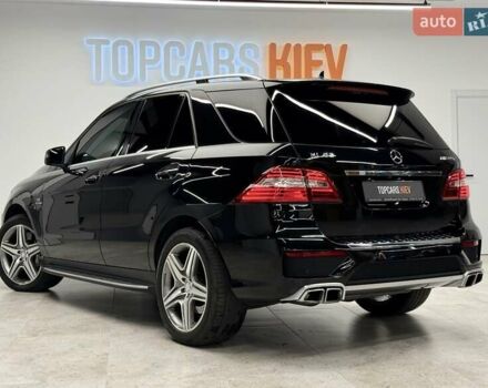 Черный Мерседес М-Класс, объемом двигателя 5.46 л и пробегом 119 тыс. км за 32990 $, фото 11 на Automoto.ua