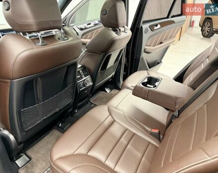 Черный Мерседес М-Класс, объемом двигателя 5.46 л и пробегом 119 тыс. км за 32990 $, фото 26 на Automoto.ua