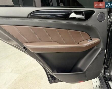 Черный Мерседес М-Класс, объемом двигателя 5.46 л и пробегом 119 тыс. км за 32990 $, фото 24 на Automoto.ua