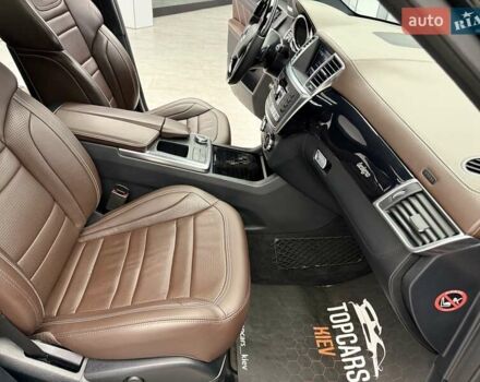 Черный Мерседес М-Класс, объемом двигателя 5.46 л и пробегом 119 тыс. км за 32990 $, фото 41 на Automoto.ua