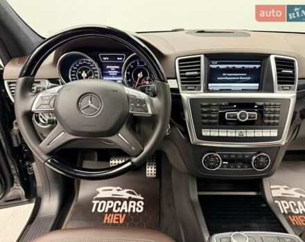 Черный Мерседес М-Класс, объемом двигателя 5.46 л и пробегом 119 тыс. км за 32990 $, фото 48 на Automoto.ua