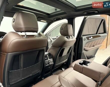 Черный Мерседес М-Класс, объемом двигателя 5.46 л и пробегом 119 тыс. км за 32990 $, фото 25 на Automoto.ua