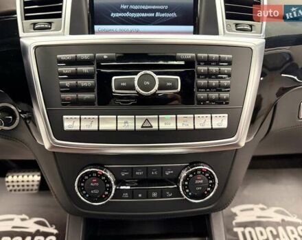 Черный Мерседес М-Класс, объемом двигателя 5.46 л и пробегом 119 тыс. км за 32990 $, фото 50 на Automoto.ua