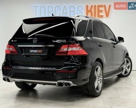 Черный Мерседес М-Класс, объемом двигателя 5.46 л и пробегом 119 тыс. км за 32990 $, фото 6 на Automoto.ua