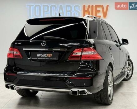 Черный Мерседес М-Класс, объемом двигателя 5.46 л и пробегом 119 тыс. км за 32990 $, фото 7 на Automoto.ua