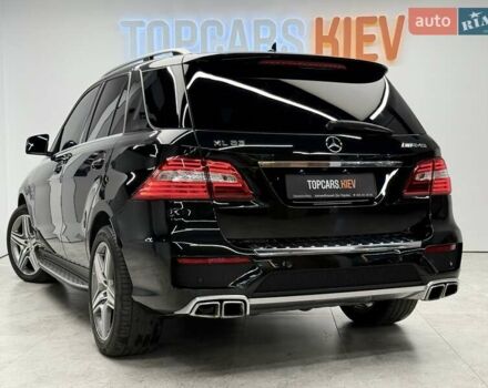 Черный Мерседес М-Класс, объемом двигателя 5.46 л и пробегом 119 тыс. км за 32990 $, фото 9 на Automoto.ua