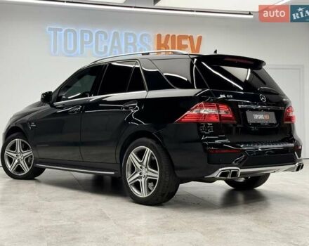 Черный Мерседес М-Класс, объемом двигателя 5.46 л и пробегом 119 тыс. км за 32990 $, фото 12 на Automoto.ua