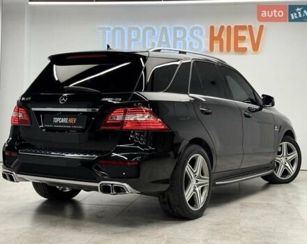 Черный Мерседес М-Класс, объемом двигателя 5.46 л и пробегом 119 тыс. км за 32990 $, фото 5 на Automoto.ua