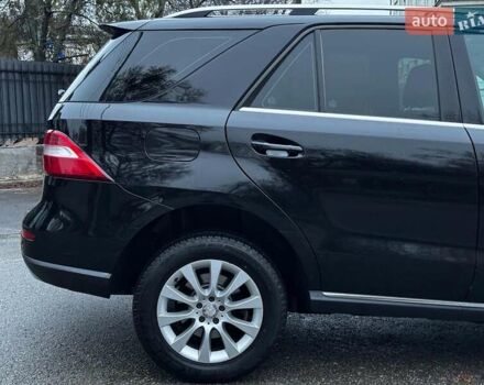 Черный Мерседес М-Класс, объемом двигателя 2.2 л и пробегом 205 тыс. км за 19490 $, фото 10 на Automoto.ua