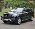 Черный Мерседес М-Класс, объемом двигателя 2.14 л и пробегом 140 тыс. км за 23500 $, фото 1 на Automoto.ua