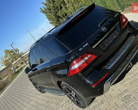 Черный Мерседес М-Класс, объемом двигателя 2.99 л и пробегом 90 тыс. км за 32000 $, фото 29 на Automoto.ua