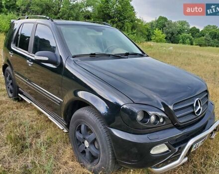 Чорний Мерседес М-Клас, об'ємом двигуна 5 л та пробігом 435 тис. км за 5800 $, фото 1 на Automoto.ua