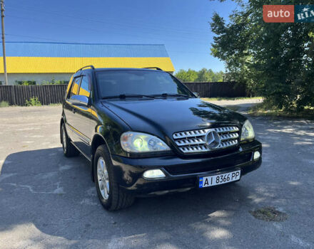 Черный Мерседес М-Класс, объемом двигателя 3.7 л и пробегом 290 тыс. км за 6350 $, фото 1 на Automoto.ua