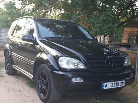 Черный Мерседес М-Класс, объемом двигателя 3.7 л и пробегом 322 тыс. км за 6000 $, фото 1 на Automoto.ua