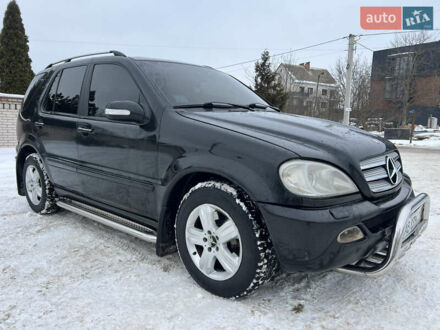 Черный Мерседес М-Класс, объемом двигателя 3.72 л и пробегом 379 тыс. км за 7500 $, фото 1 на Automoto.ua