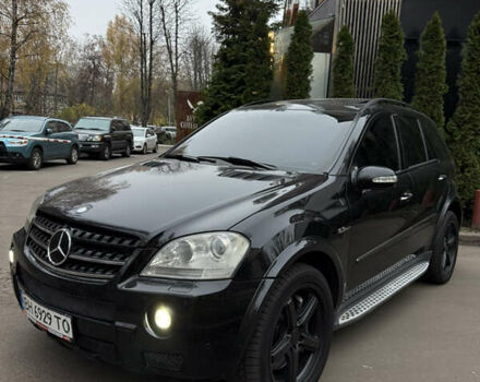 Черный Мерседес М-Класс, объемом двигателя 6.21 л и пробегом 283 тыс. км за 8600 $, фото 1 на Automoto.ua