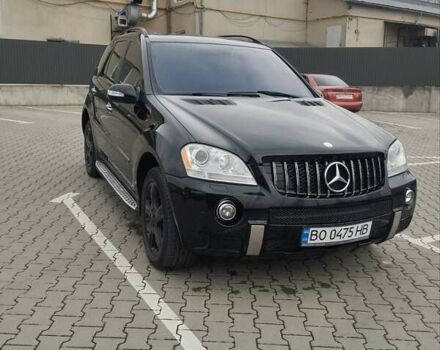 Черный Мерседес М-Класс, объемом двигателя 5.46 л и пробегом 239 тыс. км за 10800 $, фото 1 на Automoto.ua