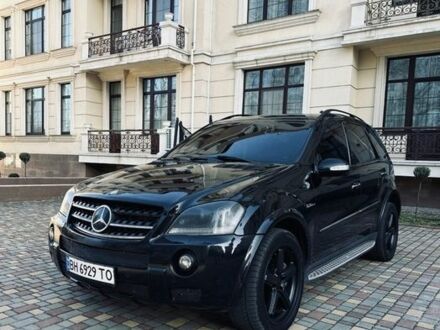 Черный Мерседес М-Класс, объемом двигателя 6.2 л и пробегом 290 тыс. км за 7900 $, фото 1 на Automoto.ua