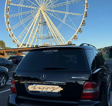 Черный Мерседес М-Класс, объемом двигателя 6.3 л и пробегом 148 тыс. км за 12500 $, фото 1 на Automoto.ua