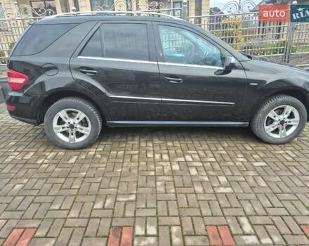 Чорний Мерседес М-Клас, об'ємом двигуна 3 л та пробігом 211 тис. км за 16900 $, фото 1 на Automoto.ua