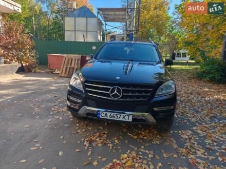 Черный Мерседес М-Класс, объемом двигателя 3 л и пробегом 143 тыс. км за 23999 $, фото 1 на Automoto.ua
