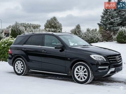 Черный Мерседес М-Класс, объемом двигателя 3 л и пробегом 163 тыс. км за 26799 $, фото 1 на Automoto.ua
