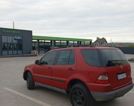 Красный Мерседес М-Класс, объемом двигателя 3.2 л и пробегом 264 тыс. км за 4850 $, фото 4 на Automoto.ua