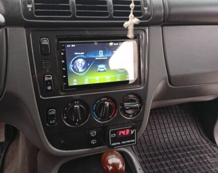 Красный Мерседес М-Класс, объемом двигателя 3.2 л и пробегом 264 тыс. км за 4850 $, фото 7 на Automoto.ua