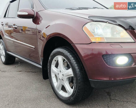 Красный Мерседес М-Класс, объемом двигателя 3.5 л и пробегом 266 тыс. км за 11499 $, фото 37 на Automoto.ua