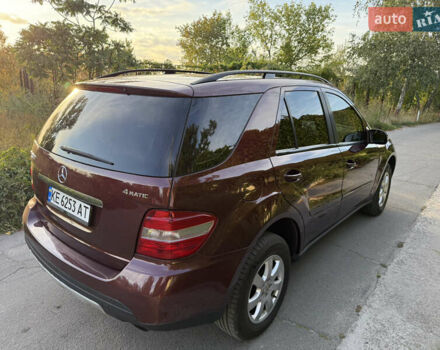 Красный Мерседес М-Класс, объемом двигателя 3.5 л и пробегом 175 тыс. км за 11500 $, фото 24 на Automoto.ua