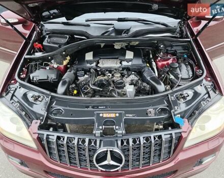 Красный Мерседес М-Класс, объемом двигателя 3.5 л и пробегом 266 тыс. км за 9333 $, фото 54 на Automoto.ua