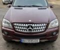 Красный Мерседес М-Класс, объемом двигателя 3.5 л и пробегом 160 тыс. км за 14000 $, фото 1 на Automoto.ua