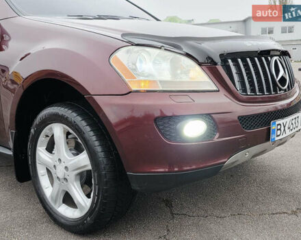Красный Мерседес М-Класс, объемом двигателя 3.5 л и пробегом 266 тыс. км за 11499 $, фото 38 на Automoto.ua