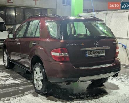 Красный Мерседес М-Класс, объемом двигателя 4 л и пробегом 222 тыс. км за 19999 $, фото 3 на Automoto.ua