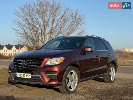 Червоний Мерседес М-Клас, об'ємом двигуна 3 л та пробігом 200 тис. км за 23500 $, фото 1 на Automoto.ua