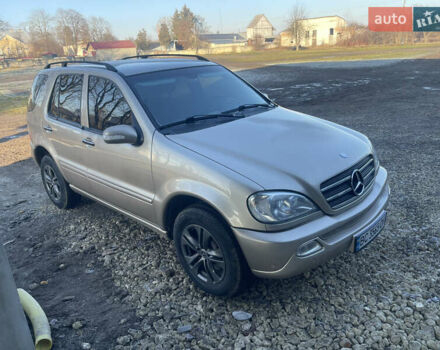 Желтый Мерседес М-Класс, объемом двигателя 4 л и пробегом 289 тыс. км за 7500 $, фото 1 на Automoto.ua