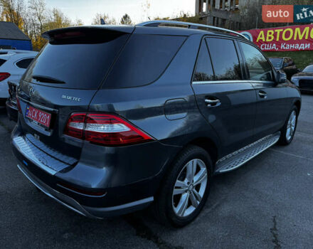 Сірий Мерседес М-Клас, об'ємом двигуна 3 л та пробігом 220 тис. км за 13900 $, фото 2 на Automoto.ua