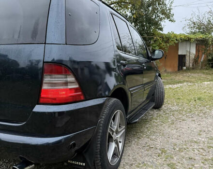 Синий Мерседес М-Класс, объемом двигателя 4.27 л и пробегом 399 тыс. км за 5999 $, фото 11 на Automoto.ua