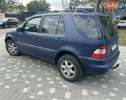 Синій Мерседес М-Клас, об'ємом двигуна 4 л та пробігом 370 тис. км за 5200 $, фото 4 на Automoto.ua