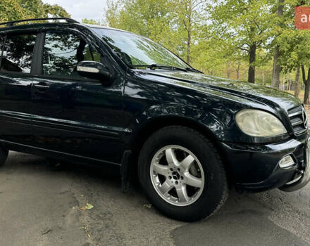 Синий Мерседес М-Класс, объемом двигателя 4 л и пробегом 240 тыс. км за 5150 $, фото 6 на Automoto.ua