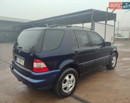 Синій Мерседес М-Клас, об'ємом двигуна 2.69 л та пробігом 219 тис. км за 5999 $, фото 4 на Automoto.ua