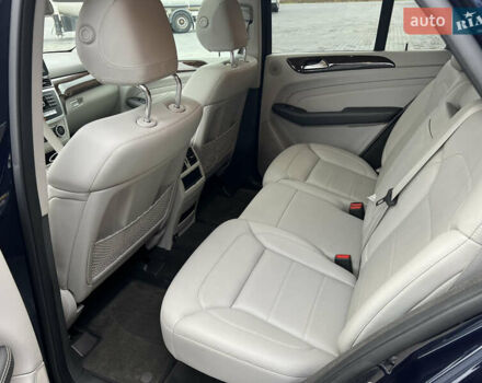 Синій Мерседес М-Клас, об'ємом двигуна 3 л та пробігом 166 тис. км за 30900 $, фото 49 на Automoto.ua