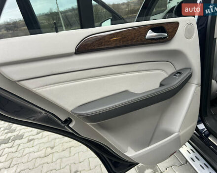 Синій Мерседес М-Клас, об'ємом двигуна 3 л та пробігом 166 тис. км за 30900 $, фото 48 на Automoto.ua