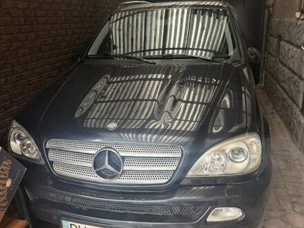 Синій Мерседес М-Клас, об'ємом двигуна 3.72 л та пробігом 245 тис. км за 8300 $, фото 1 на Automoto.ua