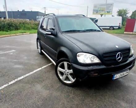 Чорний Мерседес МЛ 320, об'ємом двигуна 3.2 л та пробігом 400 тис. км за 5800 $, фото 1 на Automoto.ua