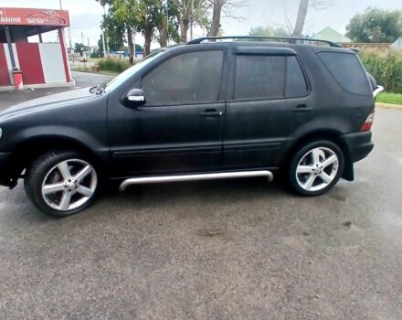 Чорний Мерседес МЛ 320, об'ємом двигуна 3.2 л та пробігом 400 тис. км за 5800 $, фото 5 на Automoto.ua