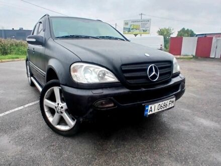 Чорний Мерседес МЛ 320, об'ємом двигуна 3.2 л та пробігом 400 тис. км за 5800 $, фото 1 на Automoto.ua