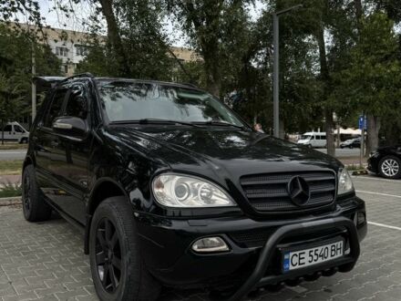 Черный Мерседес МЛ 320, объемом двигателя 3.2 л и пробегом 301 тыс. км за 7100 $, фото 1 на Automoto.ua