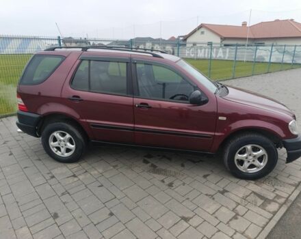 Красный Мерседес МЛ 320, объемом двигателя 3.2 л и пробегом 350 тыс. км за 5699 $, фото 6 на Automoto.ua