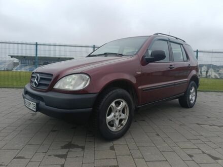Червоний Мерседес МЛ 320, об'ємом двигуна 3.2 л та пробігом 350 тис. км за 5699 $, фото 1 на Automoto.ua